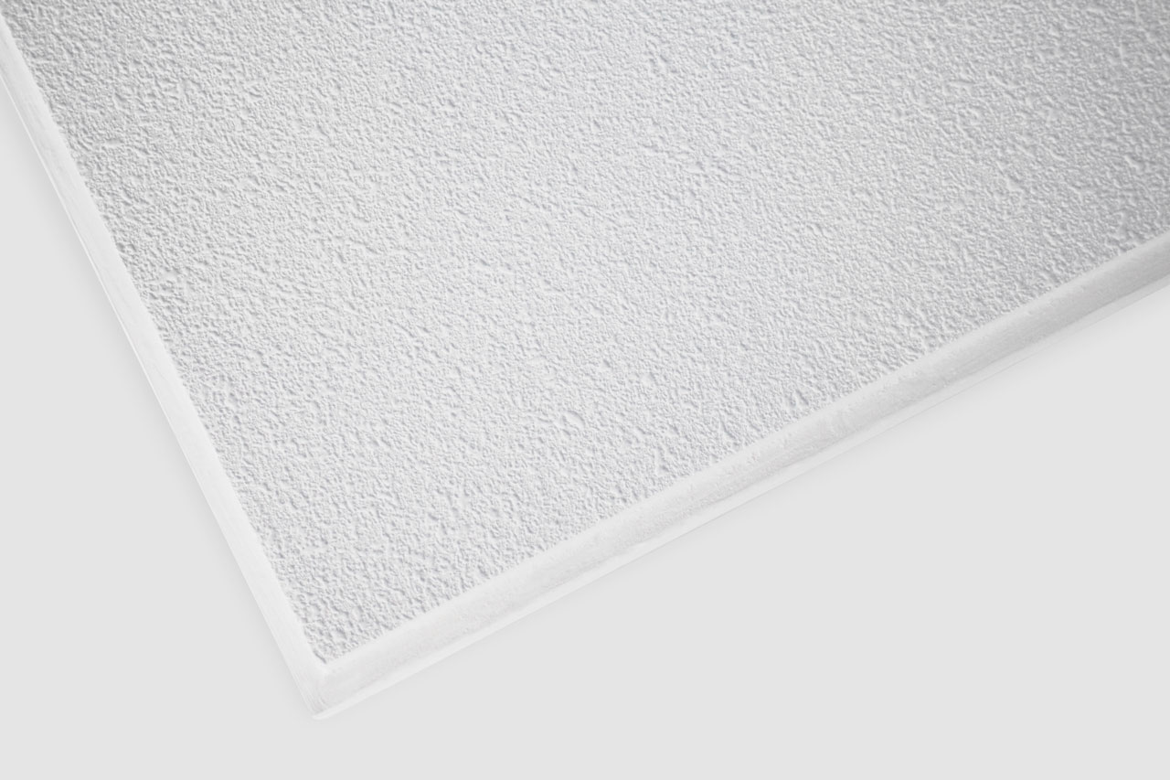 Close-up view of a white textured ceiling tile with a slightly rough surface, shown at an angle against a plain white background.