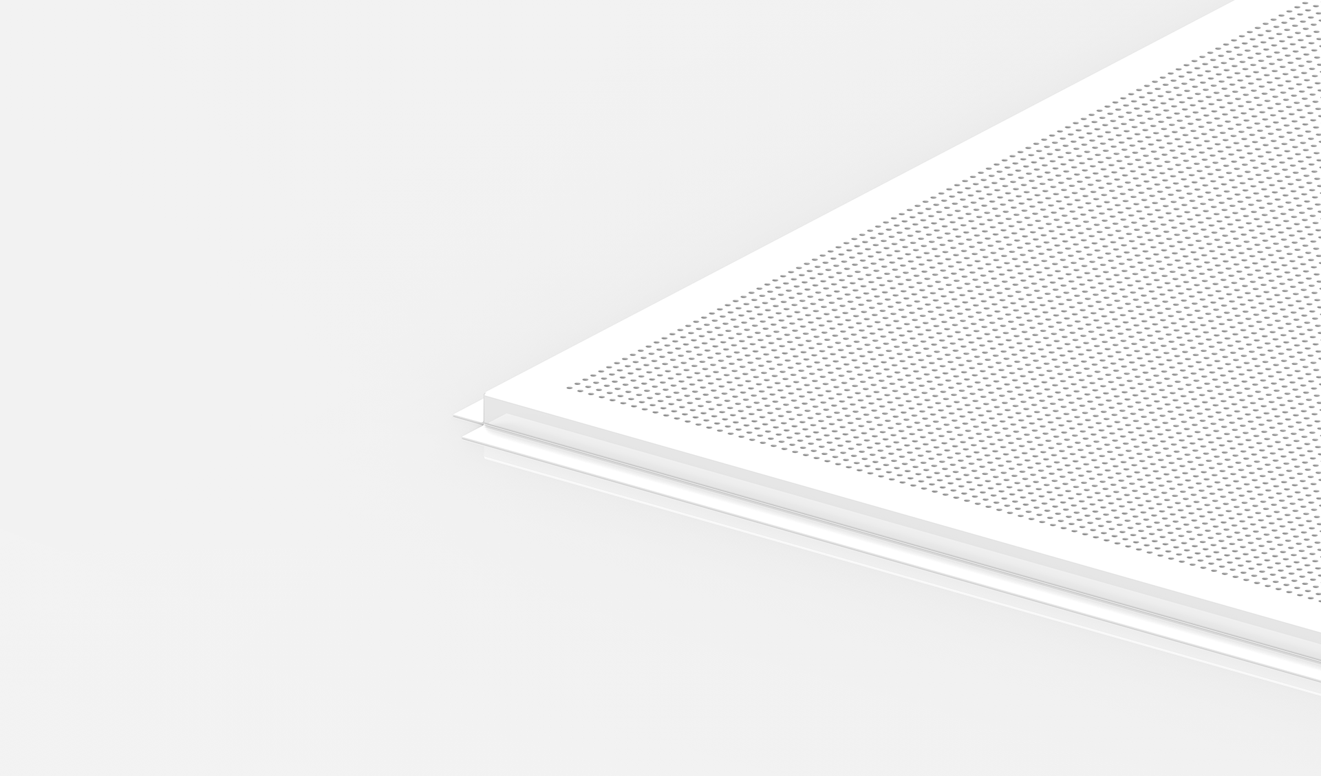 Close-up of the corner of a white sheet of paper with a grid of small, evenly spaced black dots, stacked on top of other blank sheets against a plain white background.