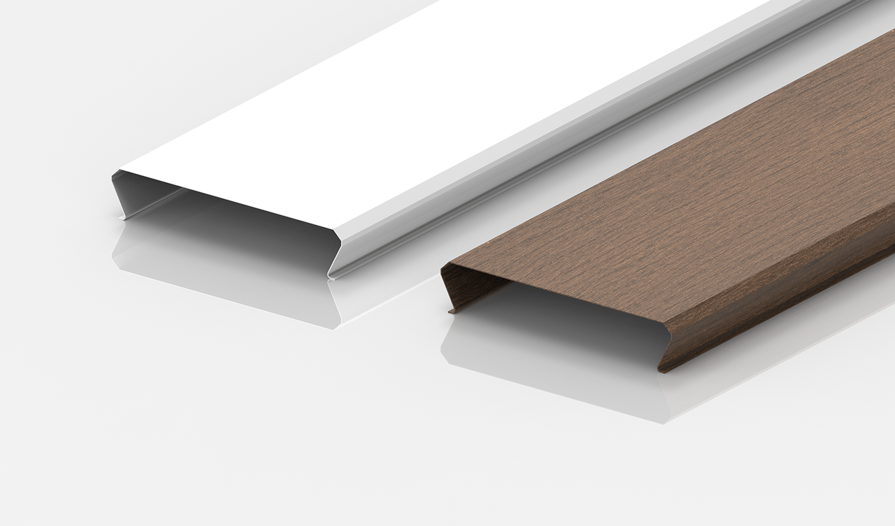 Two rectangular metal or plastic trim pieces are shown side by side on a white surface; one is white and the other has a brown wood-like finish. Both have a C-shaped cross-section.