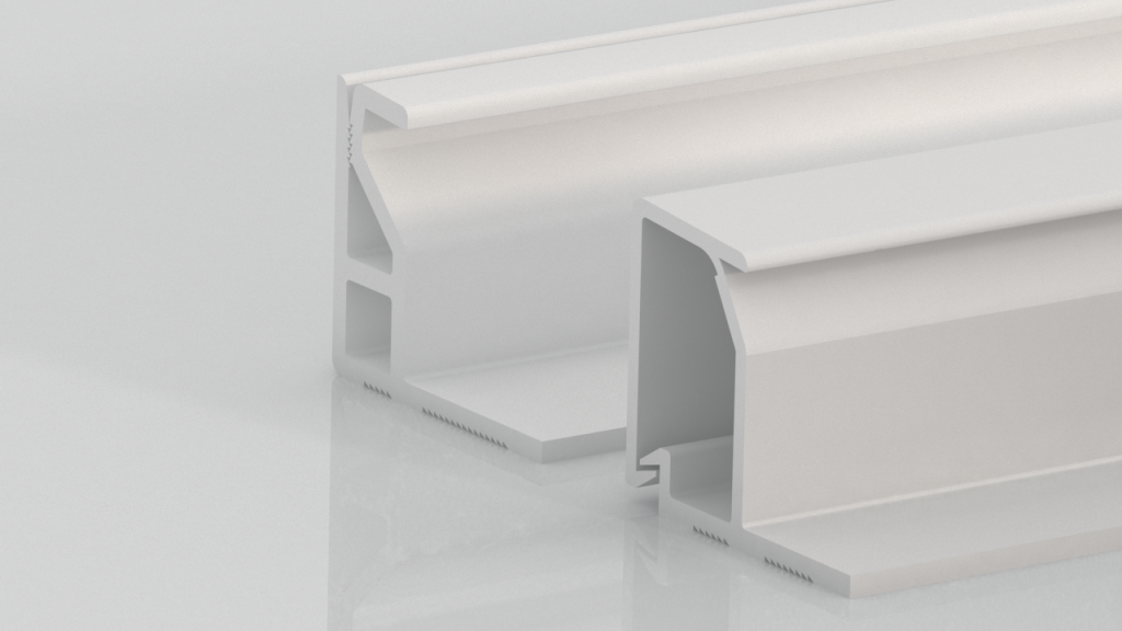 Two white, rectangular extruded plastic or metal profiles are standing on a reflective surface. The profiles have angular, hollow interiors with various ridges and slots, likely for construction or industrial use.