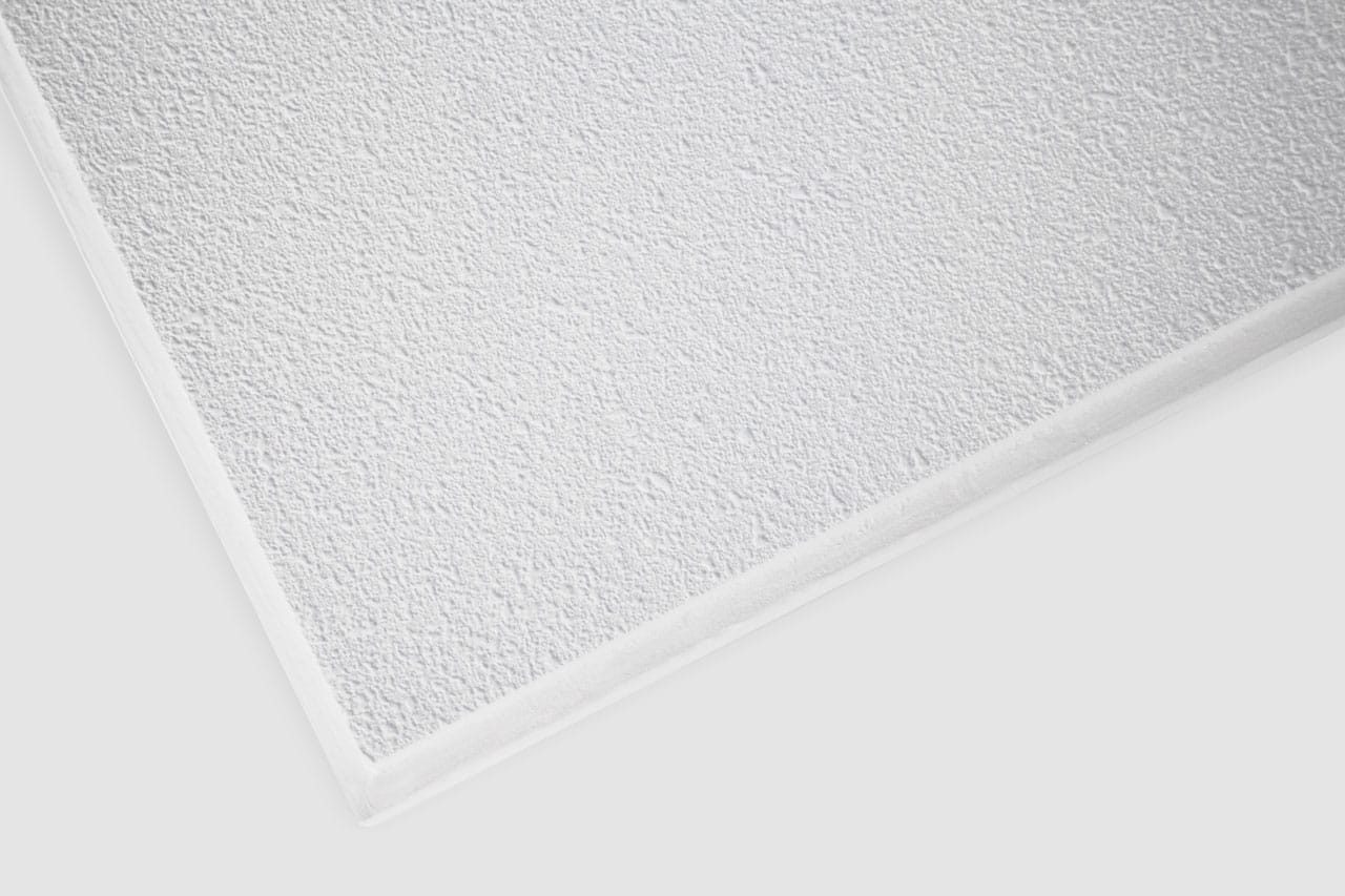 Close-up of a white, rectangular ceiling tile with a slightly rough, textured surface, shown against a plain white background.