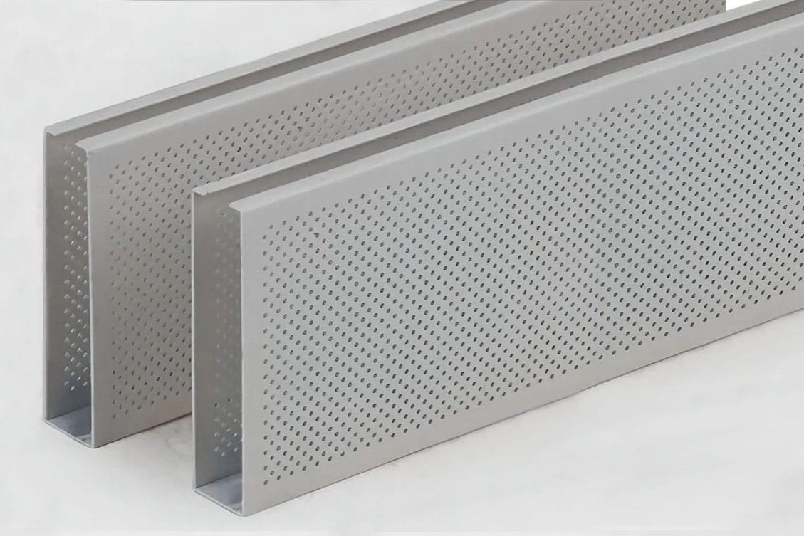 Two light gray, rectangular metal beams with perforated surfaces, standing upright on a white background.