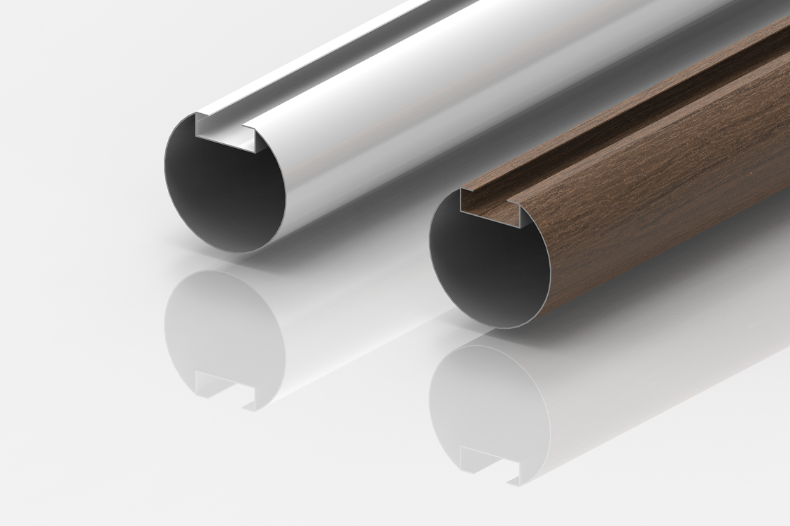 Two cylindrical metal rods with a groove running along their length are shown. One rod has a shiny silver finish, and the other has a matte brown, wood-like appearance. Both are reflected on a glossy white surface.